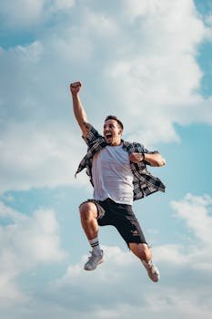 Low Angle Photography of Man Jumping